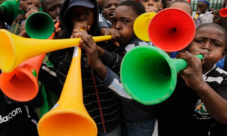 South African boys blow Vuvuzela